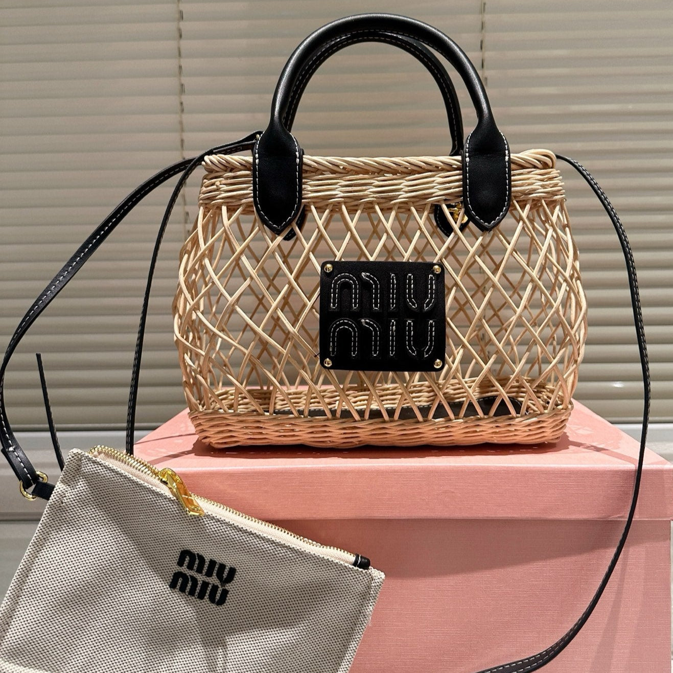 MIUMIU BAG WOVEN HOLLOW BAG 23 IN BEIGE RATTAN AND BLACK CALFSKIN TRIM