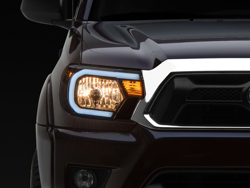 Raxiom 12 15 Toyota Tacoma Axial Series Headlights w/ LED Bar  Blk Housing (Clear Lens)