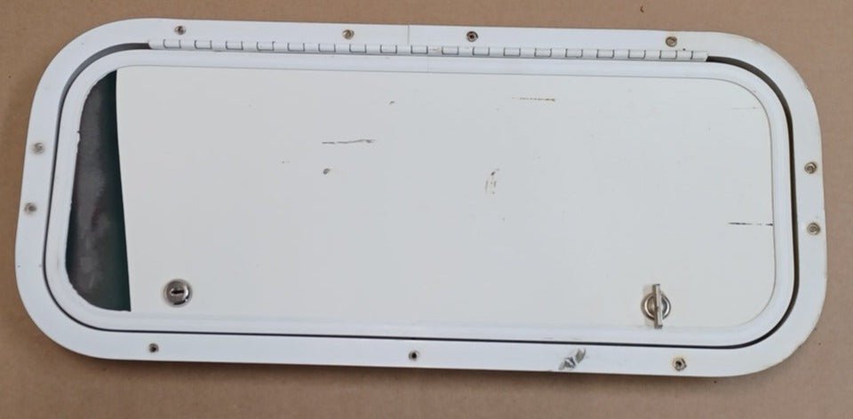 YOUNG FARTS RV PARTS Used Radius Cornered Cargo Door 23 7/8" x 9 7/8"x 1 7/8"D