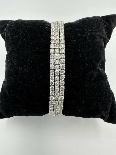 C.B.E. INC 3 STRAND TENNIS BRACELET