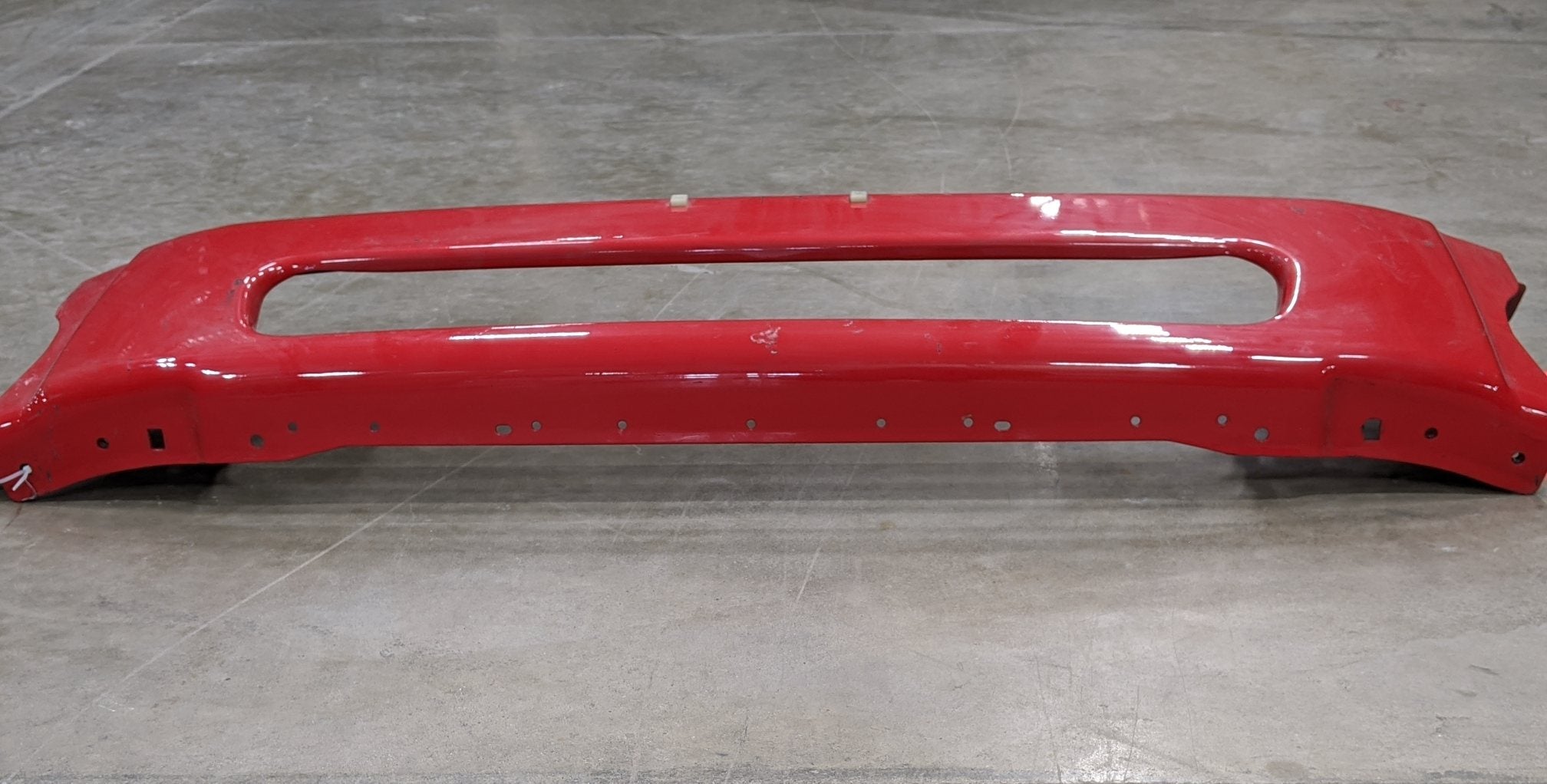 *Bent Bracket* Freightliner M2 Red  w/ License Center Bumper   P/N A21 28177 010