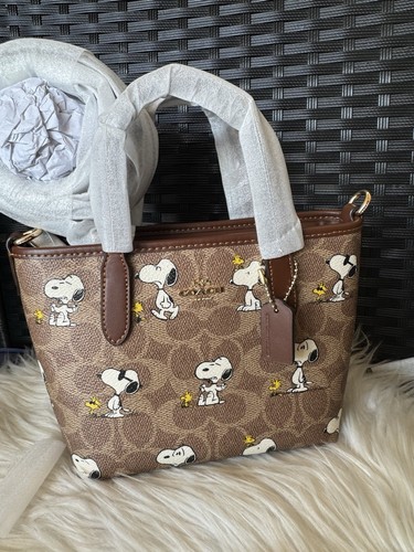 Coach X Peanuts City Mini borsa tote in tela firmata con stampa Snoopy CBS83