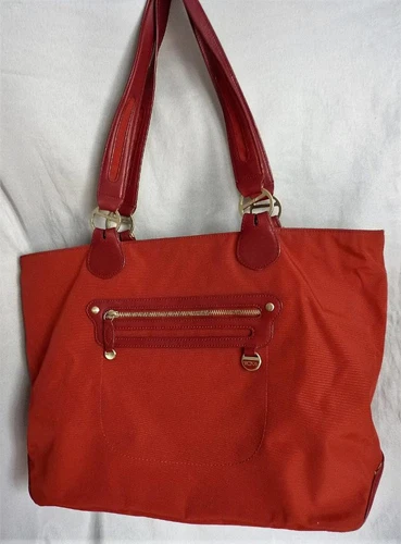 TUMI RED NYLON LEATHER CARRY ON BAG LUGGAGE