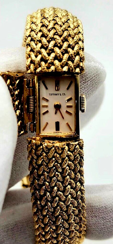 Orologio Tiffany & Co. in oro 14 carati incorporato in un bracciale in oro (bracciale con quadrante coperto)