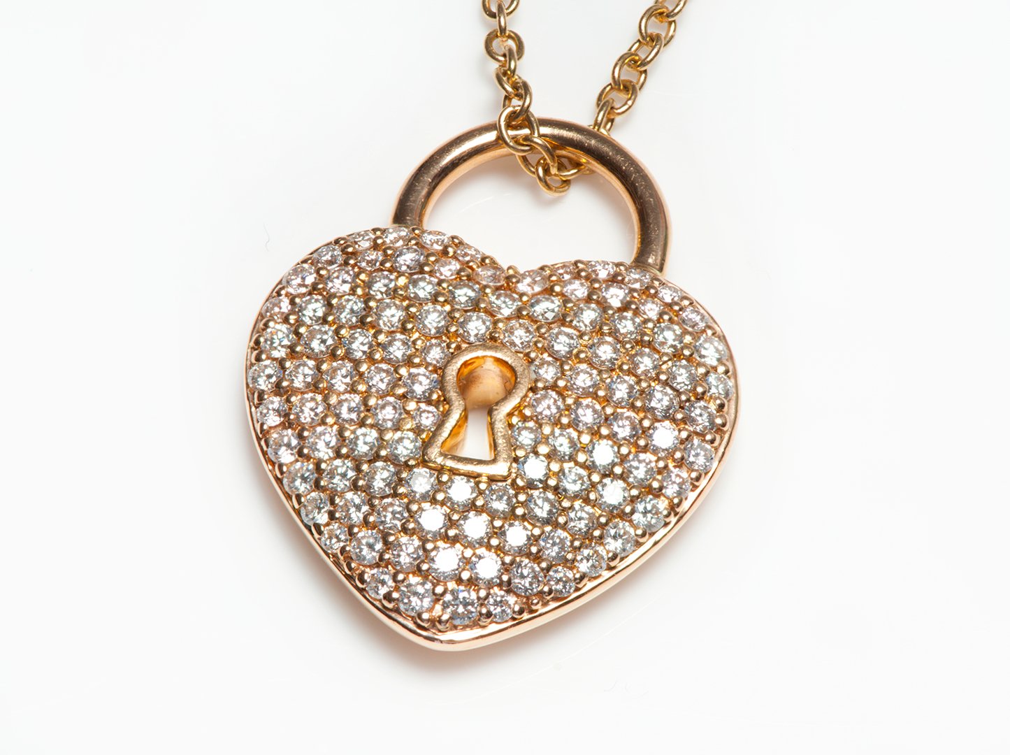 DSF ANTIQUE JEWELRY Tiffany & Co. 18K Gold Diamond Heart Lock Pendant