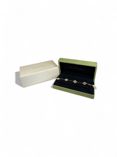 Van Cleef & Arpels White Five Stone Bracelet   Retail Price: $5300