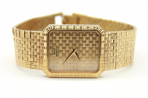 VINTAGE MEN`S PIAGET 18K YELLOW G QUARTZ WATCH.24mmX28mm.crown on the back