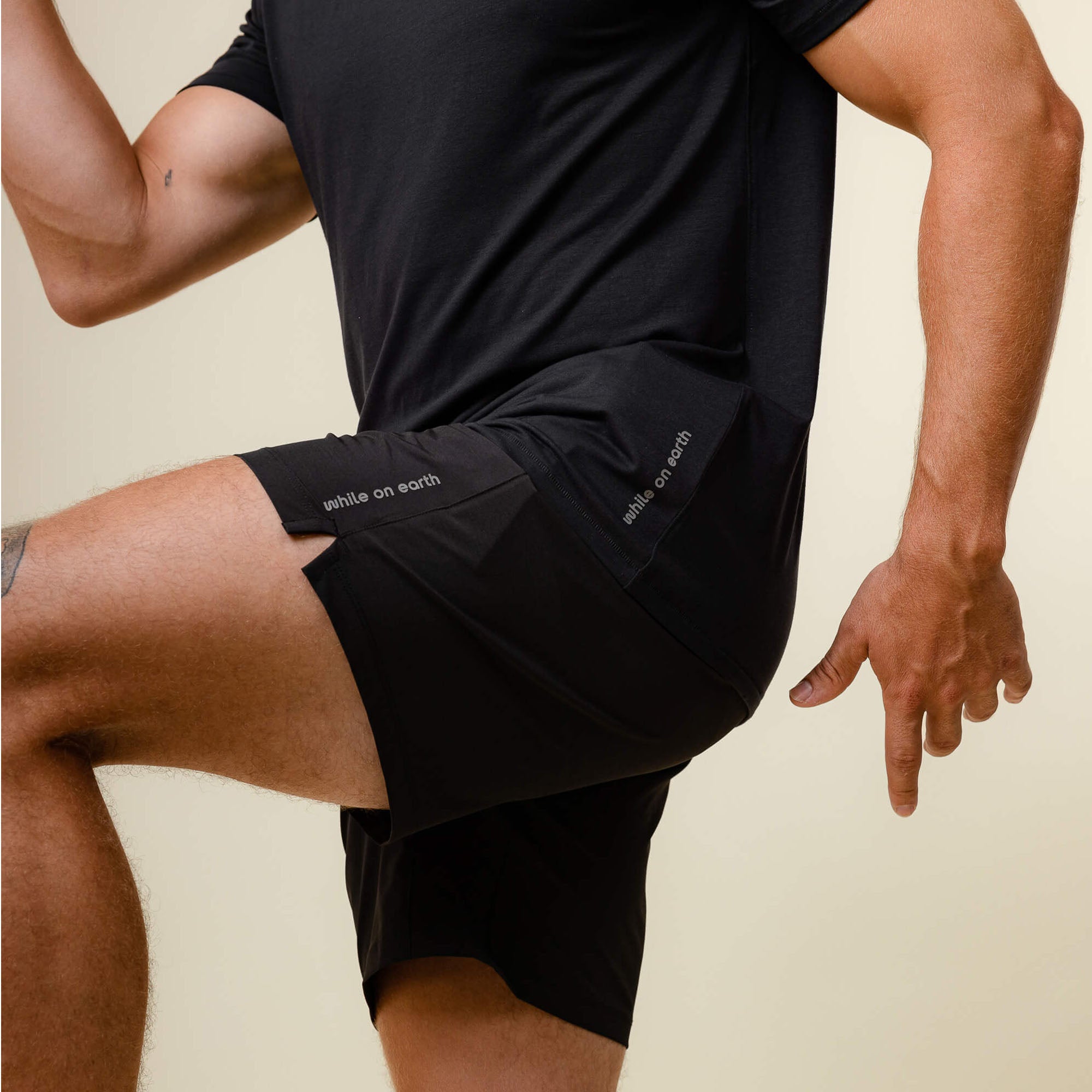 WHILE ON EARTH Mens Origin 7" Shorts