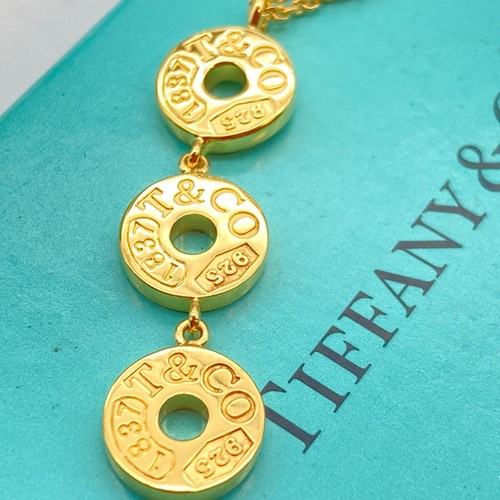 TIFFANY & CO. Collana Tiffany & Co placca oro 1837 triplo tre cerchi lariat 16" argento 4 9g