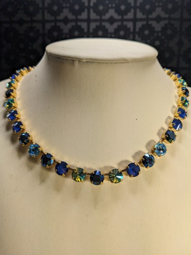 SWAROVSKI Collana e Orecchini Cristallo Blu Metallico Scuro In Oro 14k