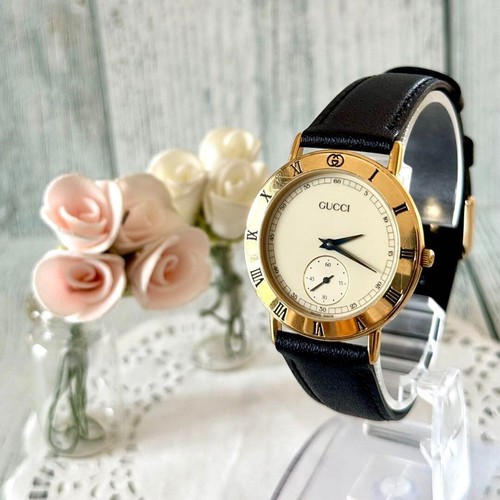 OROLOGIO GUCCI 3000.2.M ORO QUADRANTE NERO VINTAGE QUARZO Usatoone Giap Raroo
