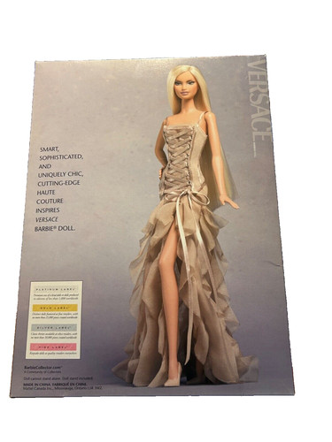 Barbie 2004 etichetta oro coll. Barbie Donatello Versace con suggestivo abito lodato